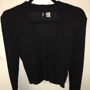 Black long sleeve sparkly top. Choker collar